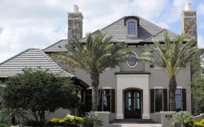 gray home with palm trees in front coral springs fl